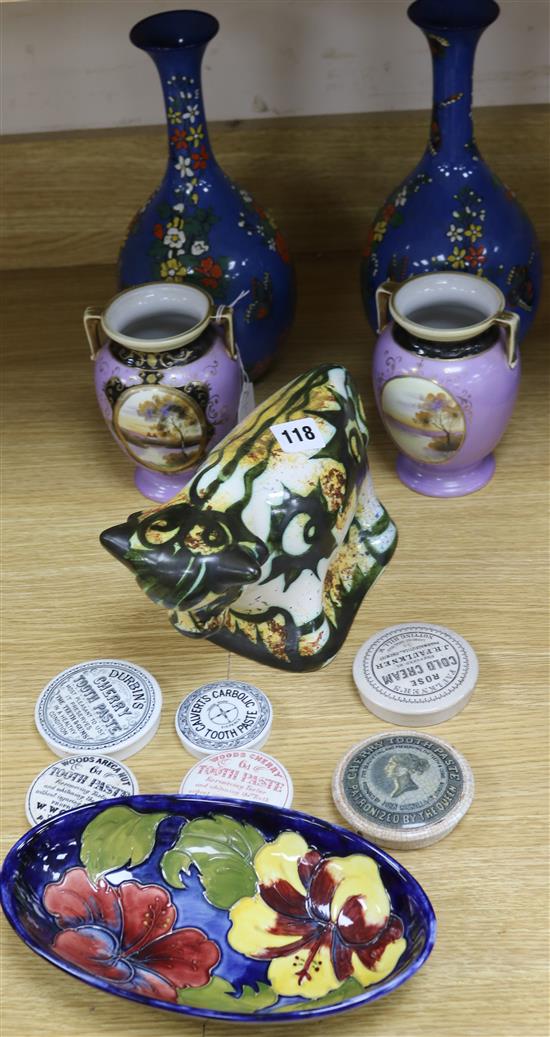 A Moorcroft Hibiscus dish, a pair of Noritake vases, a pair of powder blue vases, a studio pottery figure and toothpaste pot lids